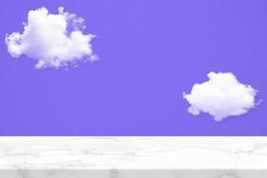 Marble Table with White Cloud with Blue Concrete Wall Texture Background, Suitable for Product Presentation Backdrop, Display, and Mock up. photo
