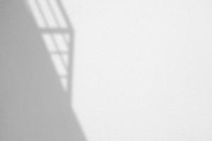 Shadow of Balcony on White Concrete Wall Background with Space for Text. photo