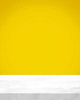 White Marble Table with Yellow Beige Gradient Background in Social Media Image Sizes, Suitable for Product Photography Backdrop, Display, and Mock up. photo