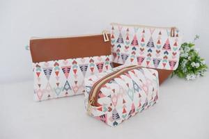 beautiful and patterned pouch as background photo