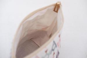 beautiful and patterned pouch as background photo
