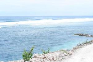 panoramic atmosphere of a beautiful beach with blue sky photo