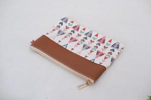 beautiful and patterned pouch as background photo