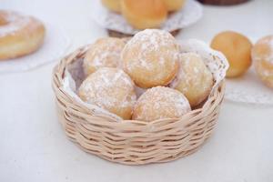 delicious snowball donuts as a background photo