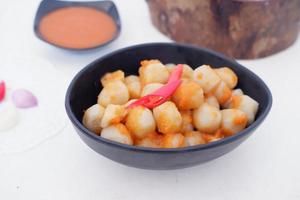 small meatballs with sauce as a background photo