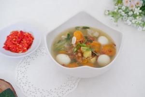 delicious quail egg soup as background photo