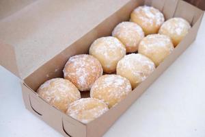 delicious snowball donuts as a background photo