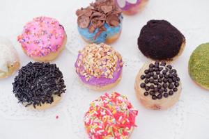 ball donuts with various flavors as a background photo