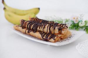 delicious chocolate flavored banana rolls photo