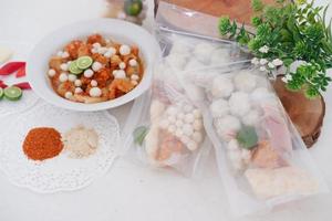 Meatballs with Peanut Crackers as a Background photo