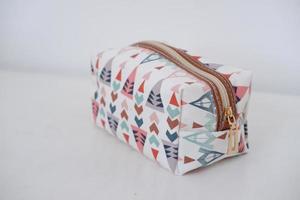 beautiful and patterned pouch as background photo