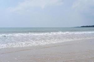 panoramic atmosphere of a beautiful beach with blue sky photo