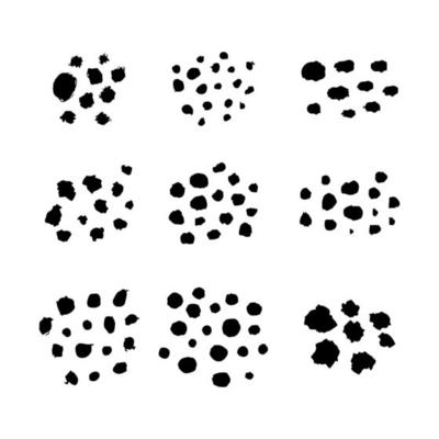 Set of blots. Black spots of paint on a white background. Grunge frame of paint.