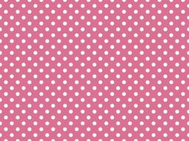 white polka dots over pale violet red background photo