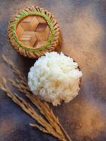 Sticky rice in traditional bamboo basket. photo