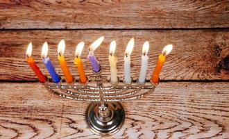 Jewish holiday Hanukkah background with menorah photo