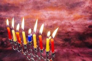 Jewish holiday Hanukkah creative background with menorah. View from above focus on . photo