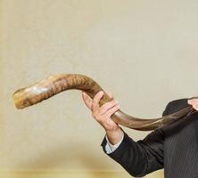 Shofar a tallit on white background - rosh hashanah jewesh holiday concept photo