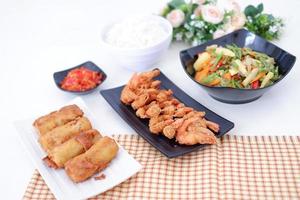 Indonesian food. lunch menu, rice with shrimp and side dishes photo