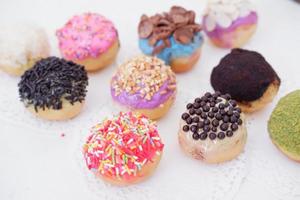 ball donuts with various flavors as a background photo