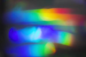 fondo de bokeh holográfico de arco iris. desbordamientos multicolores de color. foto