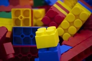 Multi-colored blocks of plastic constructor. photo