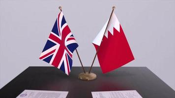 bahrain e Reino Unido bandeira. política conceito, parceiro acordo entre países. parceria acordo do governos video