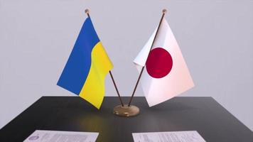 Ukraine and Japan flags on politics meeting animation video