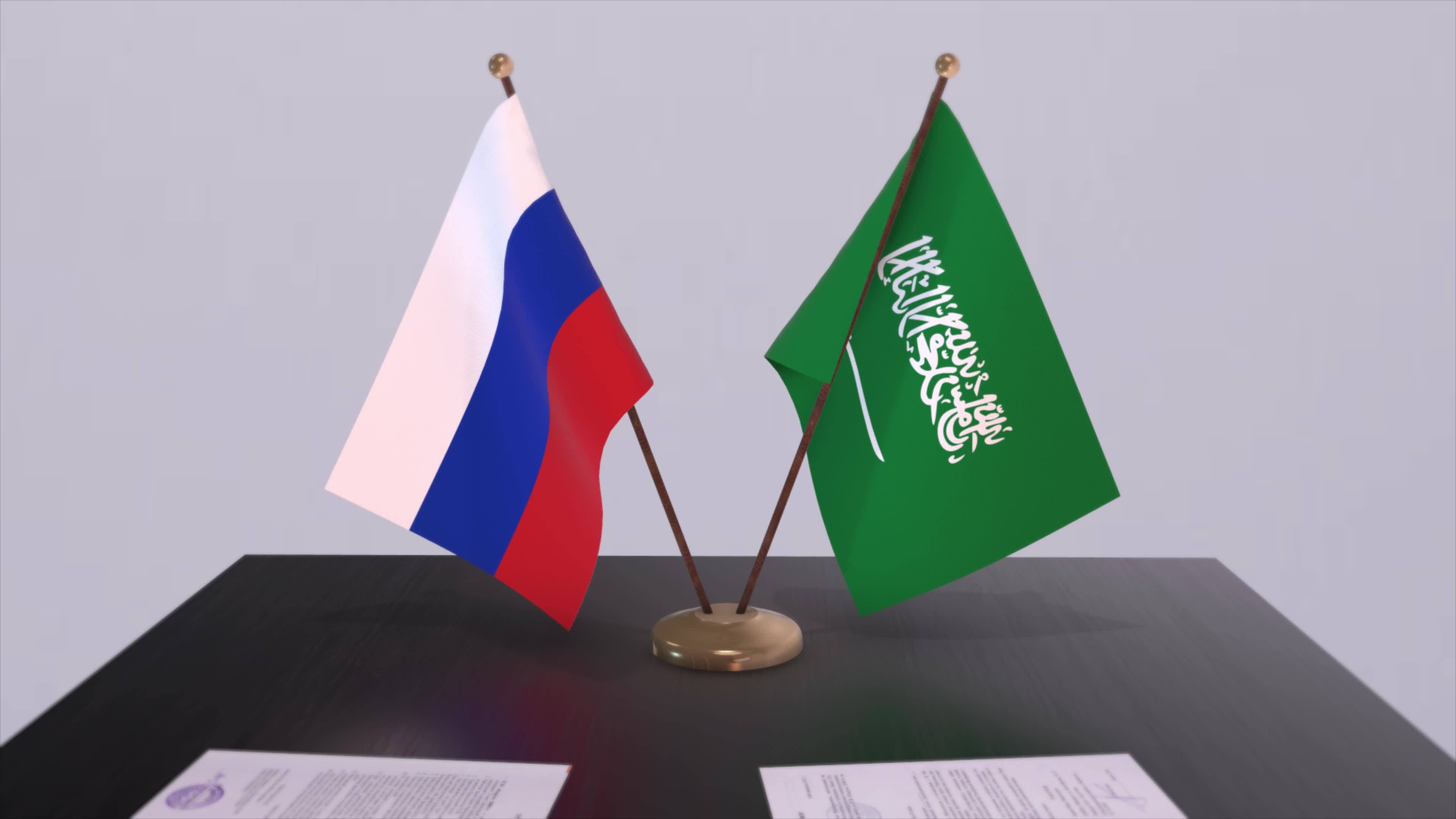 Saudi Arabia and Russia national flag, business meeting or diplomacy deal. Politics agreement
