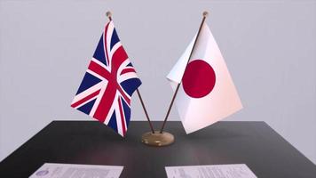 Japan and UK flag. Politics concept, partner deal between countries. Partnership agreement of governments video