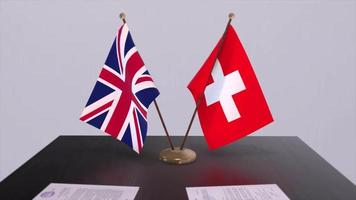 Switzerland and UK flag. Politics concept, partner deal between countries. Partnership agreement of governments video