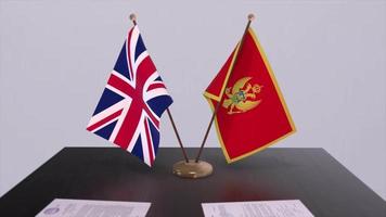 Montenegro and UK flag. Politics concept, partner deal between countries. Partnership agreement of governments video