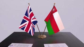 Oman and UK flag. Politics concept, partner deal between countries. Partnership agreement of governments video