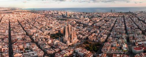 Aerial view of Barcelona City Skyline and Sagrada Familia Cathedral at sunset. photo