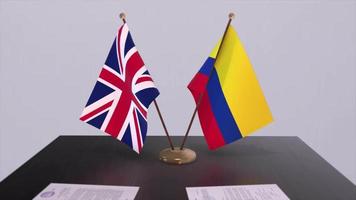 Colombia and UK flag. Politics concept, partner deal between countries. Partnership agreement of governments video