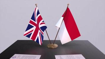 Monaco and UK flag. Politics concept, partner deal between countries. Partnership agreement of governments video