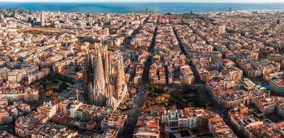 Aerial view of Barcelona City Skyline and Sagrada Familia Cathedral at sunset. photo