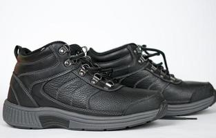 Black women's leather winter sneakers with laces. No logo