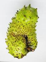 Soursop or green apple on a white background. photo
