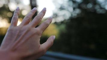 Female hand from the car window video