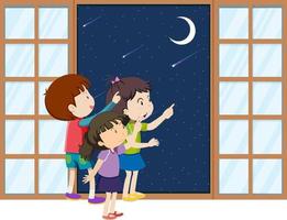 dos niños parados en la ventana y mirando la luna vector