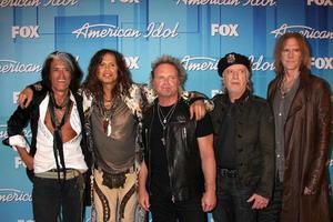 LOS ANGELES  MAY 23 - Aerosmith   L R  Musicians Joe Perry, Steven Tyler, Joey Kramer, Brad Whitford, and Tom Hamilton in the Press Room of the American Idol 2012 Finale at Nokia Theater on May 23, 2012 in Los Angeles, CA photo