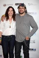 LOS ANGELES, MAY 24 - Annie Duke, Joe Reitman
 arriving at the Celebrity Casino Royale Event at Avalon on May 24, 2011 in Los Angeles, CA photo