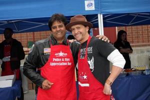 LOS ANGELES, NOV 18 -  Erik Estrada, Clifton Collins, Jr arrives at the 2010 Hollywood Chamber of Commerce Fire Dept  and Police Appreiciation Luncheon at Wilcox Police Station on November 18, 2010 in Los Angeles, CA photo