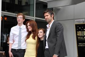 LOS ANGELES, OCT 3 -  Caleb Freundlich, Julianne Moore, Liv Freundlich, Bart Freundlich at the Hollywood Walk of Fame Ceremony for Julianne Moore at W Hollywood Hotel on October 3, 2013 in Los Angeles, CA photo