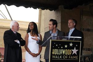 LOS ANGELES, MAR 16 - Malcolm McDowell, Garcelle Beauvais, Mark-Paul Gosselaar, Reed Diamond at the Malcolm McDowell Walk of Fame Star Ceremony for The Muppets at the Hollywood Boulevard on March 16, 2012 in Los Angeles, CA photo