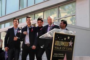 LOS ANGELES, OCT 9 - New Kids On The Block, Jordan Knight, Donnie Wahlberg, Joe McIntyre, Danny Wood, Jonathan Knight at the New Kids On the Block Hollywood Walk of Fame Star Ceremony at Hollywood Boulevard on October 9, 2014 in Los Angeles, CA photo