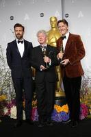 LOS ANGELES, MAR 2 - Jason Sudeikis and Filmmakers Malcolm Clarke and Nicholas Reed, winners of Best Documentary, Short Subject at the 86th Academy Awards at Dolby Theater, Hollywood and Highland on March 2, 2014 in Los Angeles, CA photo