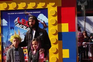 LOS ANGELES, FEB 1 - Travis Barker, children at the Lego Movie Premiere at Village Theater on February 1, 2014 in Westwood, CA photo