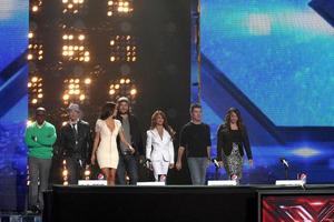 LOS ANGELES, DEC 19 - L A Reid, Chris Rene, Nicole Scherzinger, Josh Krajcik, Paula Abdul, Simon Cowell, Melanie Amaro at the FOX s The X Factor Press Conference at CBS Studios on December 19, 2011 in Los Angeles, CA photo